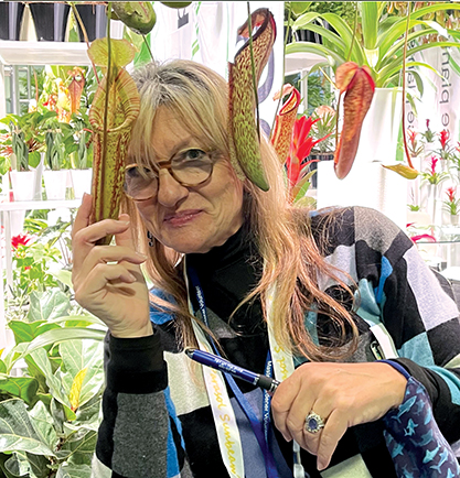 Juliet Johnson with a Pitcher plan at the Tropical Plant Expo.