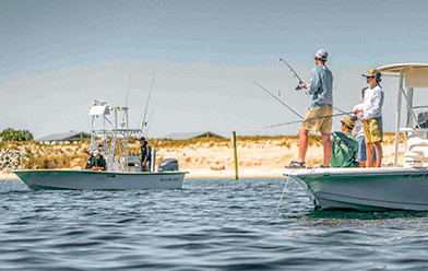 people fishing on a boat in Seaside